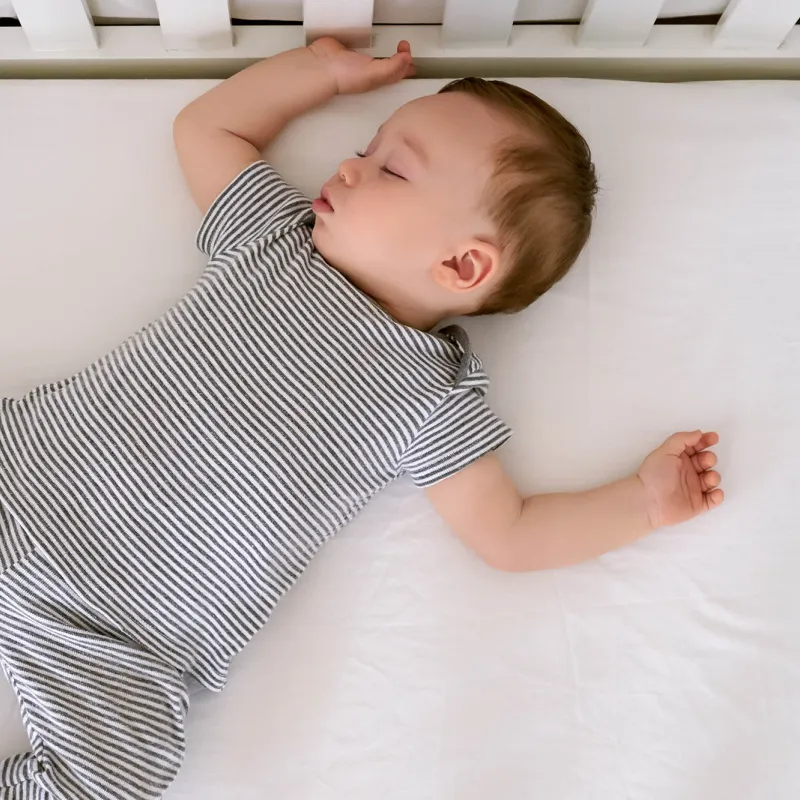 Baby sleeping in crib