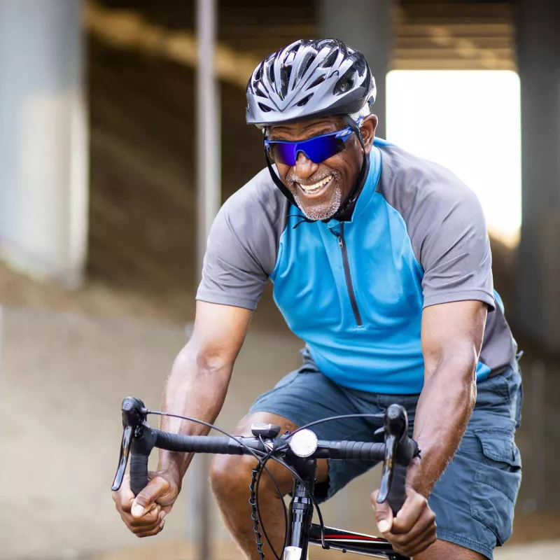 LP-Hero-Desktop-west-cv-vascular-senior-black-man-riding-bike