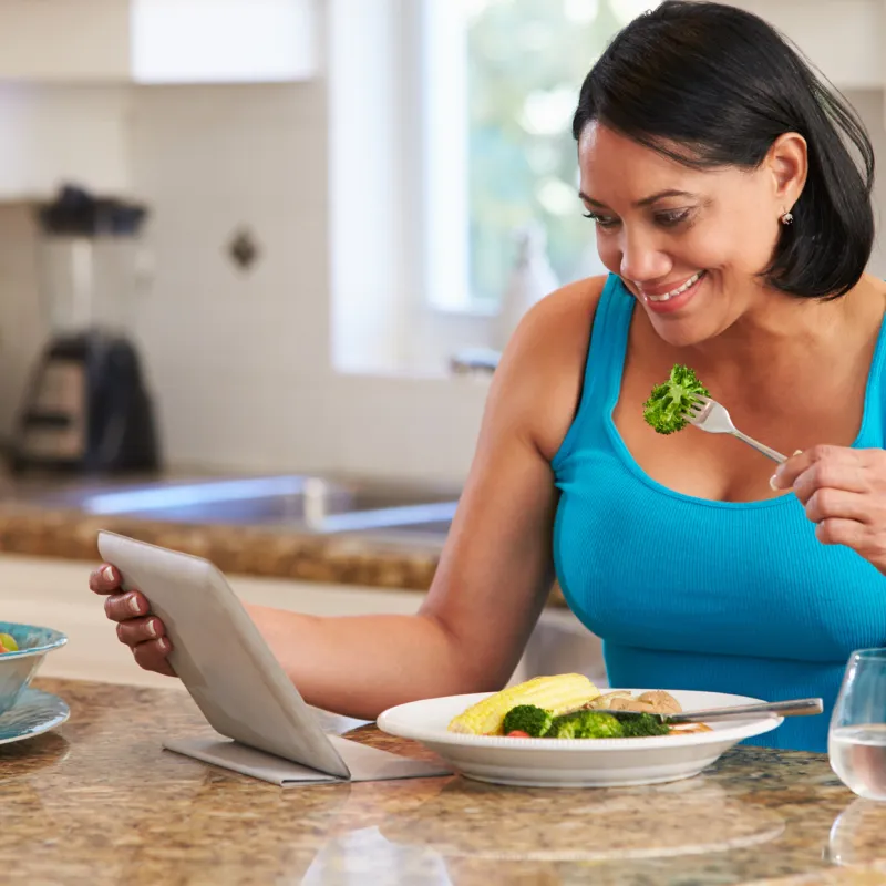 A woman views her lab results on the AdventHealth app