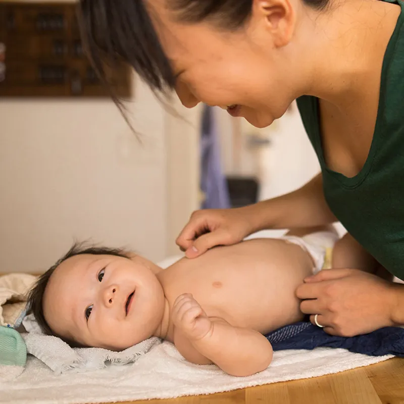 Mom Laughing with Infant