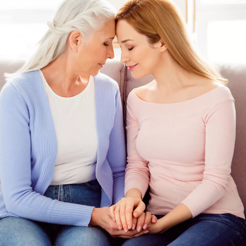 Mother and Daughter Comforting Each Other