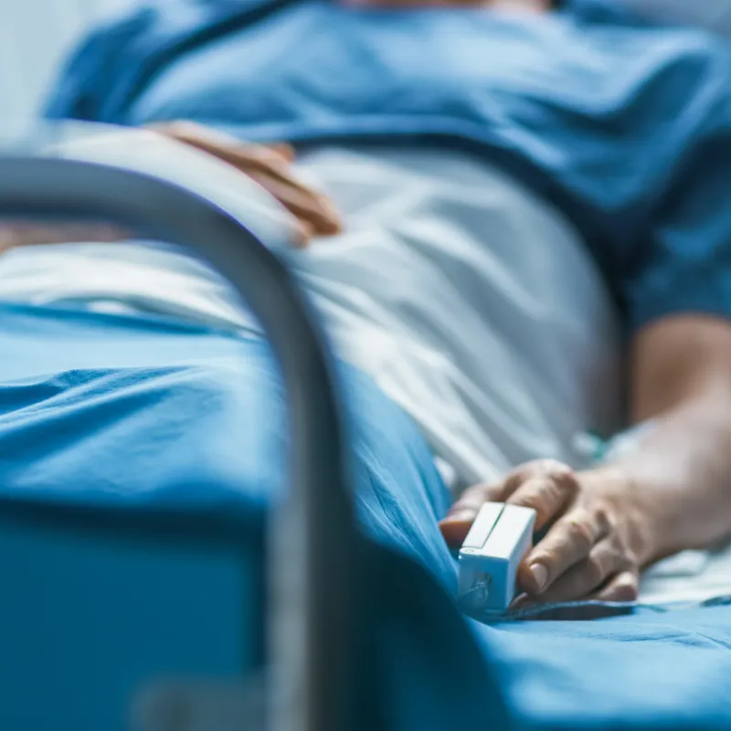 patient laying down on a hospital bed