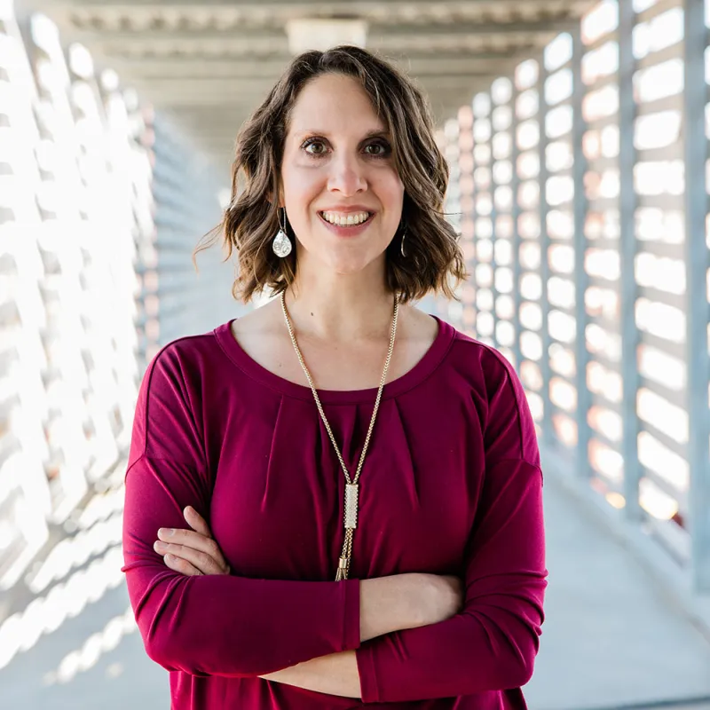Headshot of Living in Vitality keynote speaker, Ashley Smith, PhD.