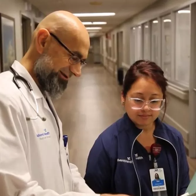 Physicians chatting in hallway