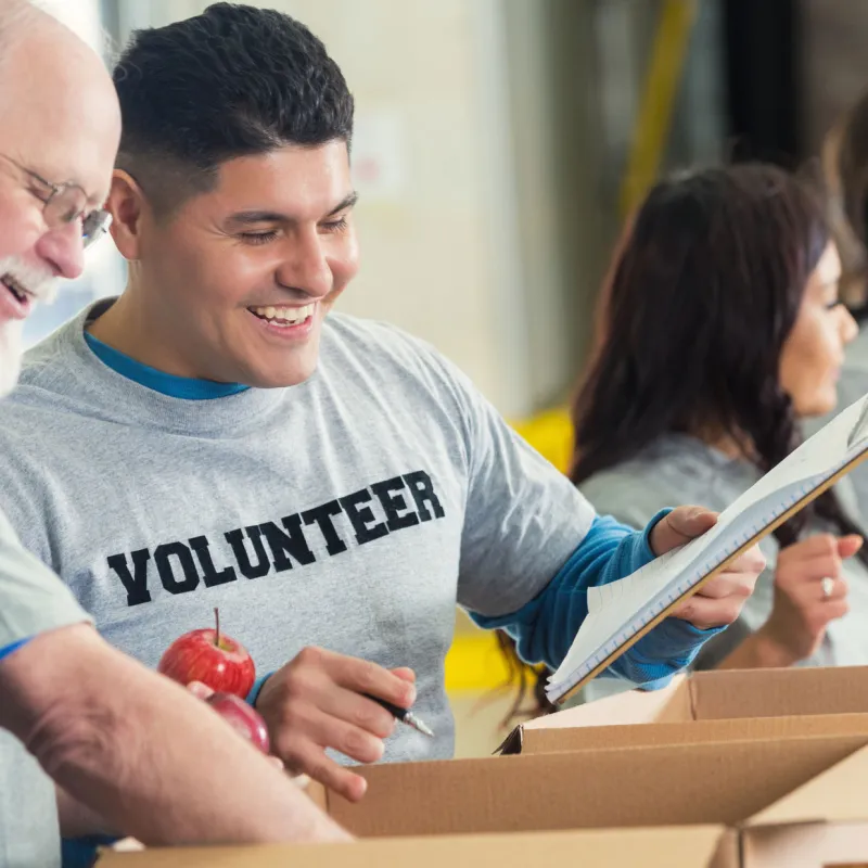 A group of volunteers organize donations. 