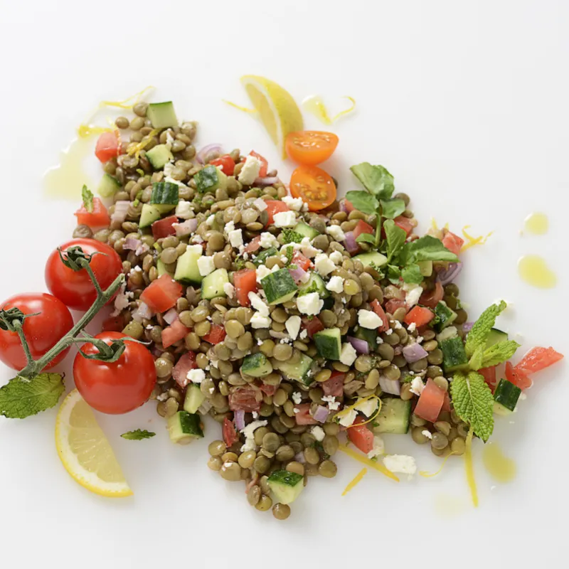 Garden lentil salad with tomato garnishes