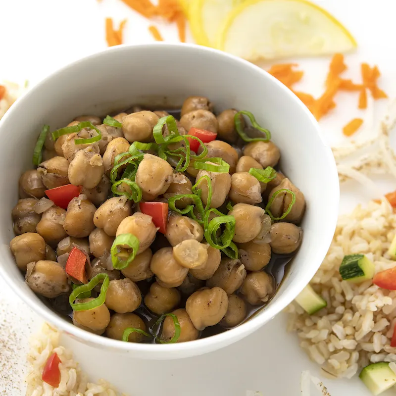 Bowl of garam masala brown rice bowl with garbanzos