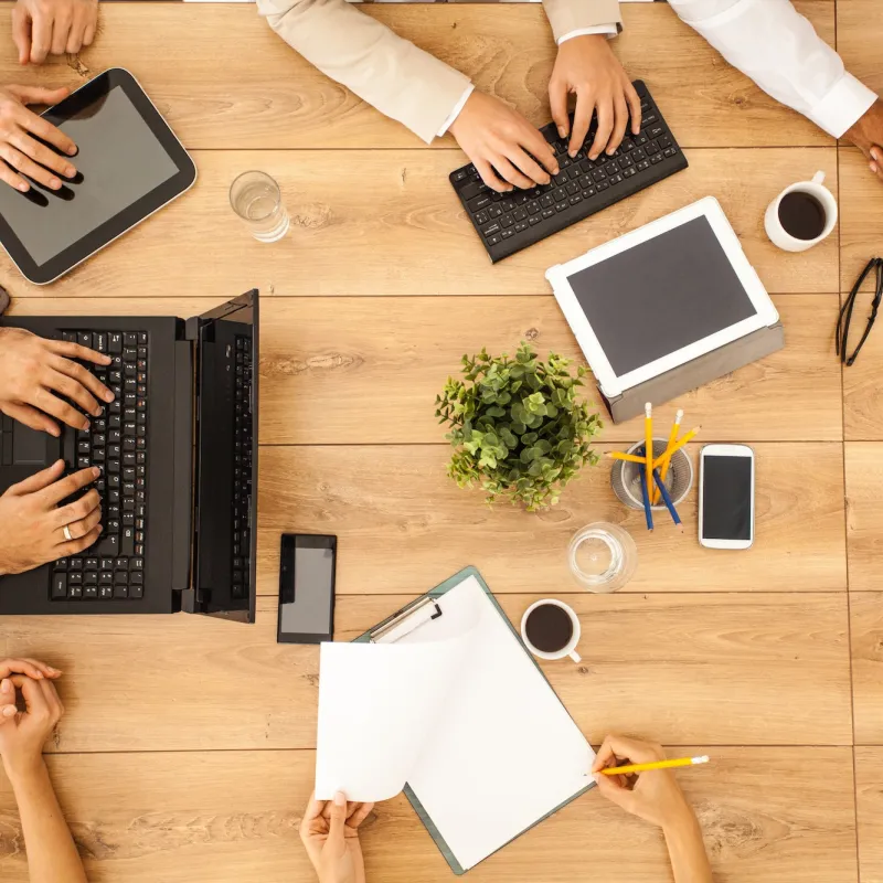 Group collaboration on a table.