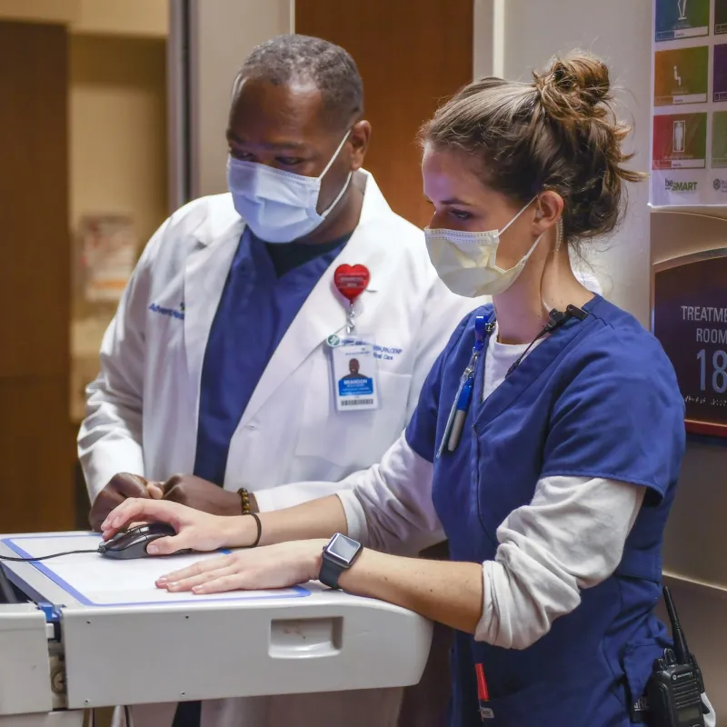 Two AdventHealth team members in the hospital.