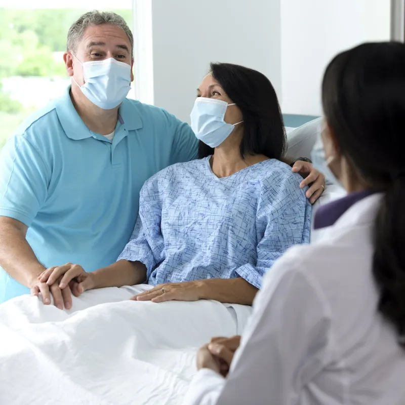 A couple in a hospital room at AdventHealth.