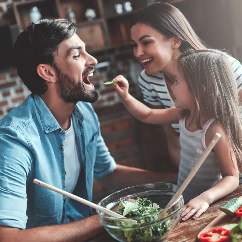 A family enjoying their cooking moment together