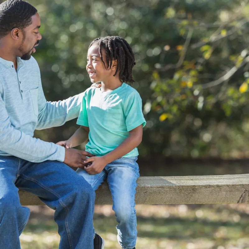 A father has a heart to heart conversation with his son.