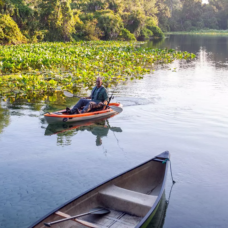 Man paddling a kayak