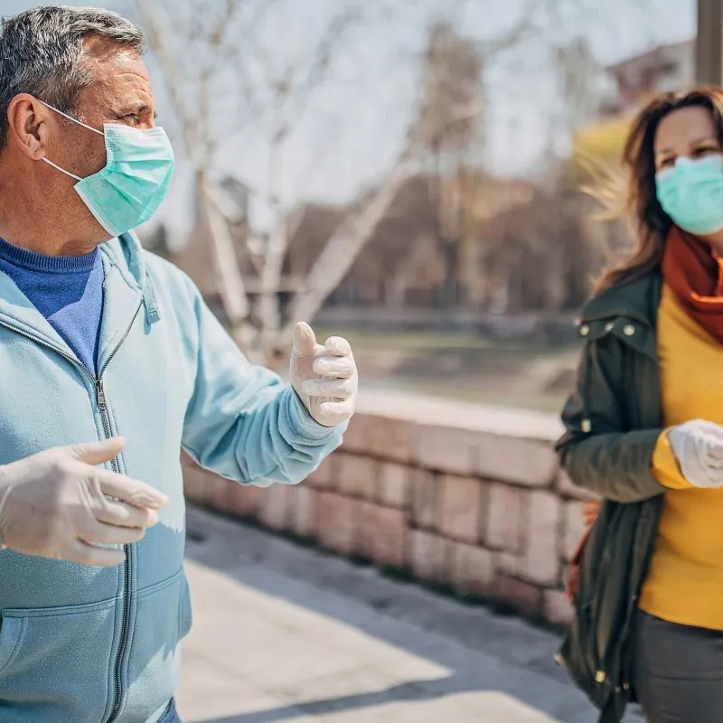 A man and woman taking a walk together.