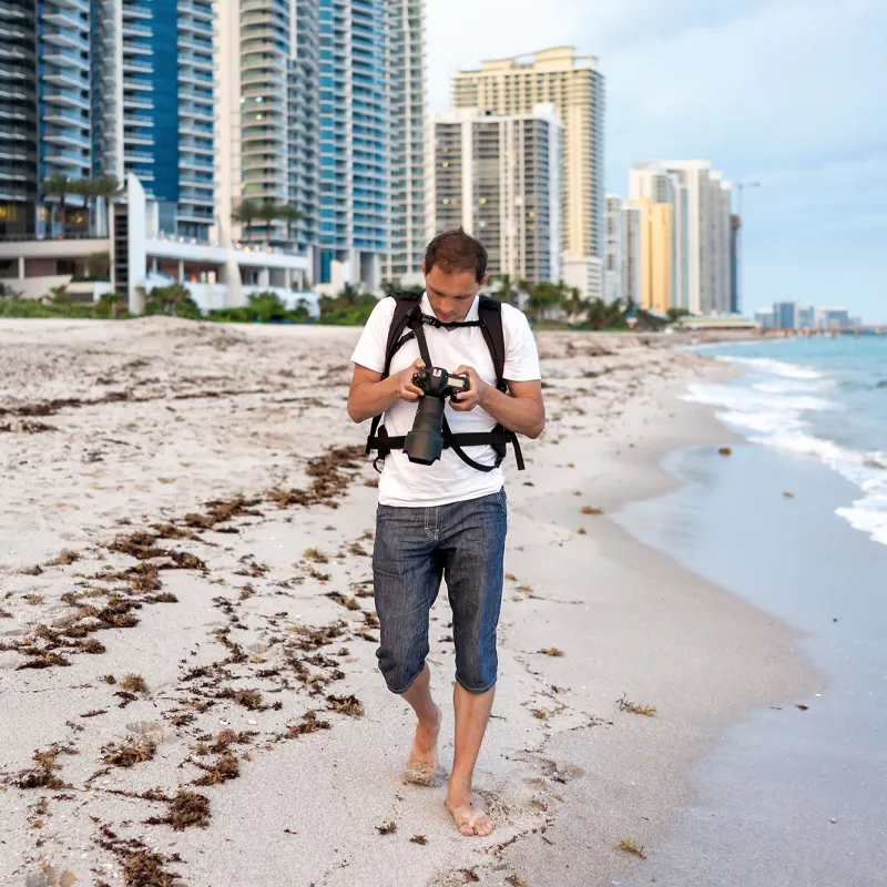 A man walking on the beach.