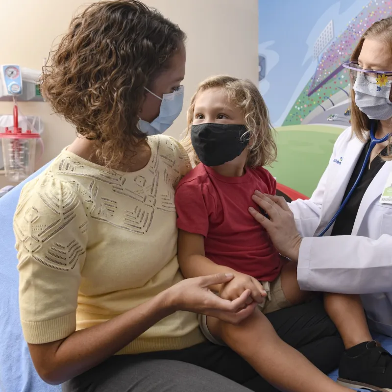 A family in a pediatric emergency room at AdventHealth.