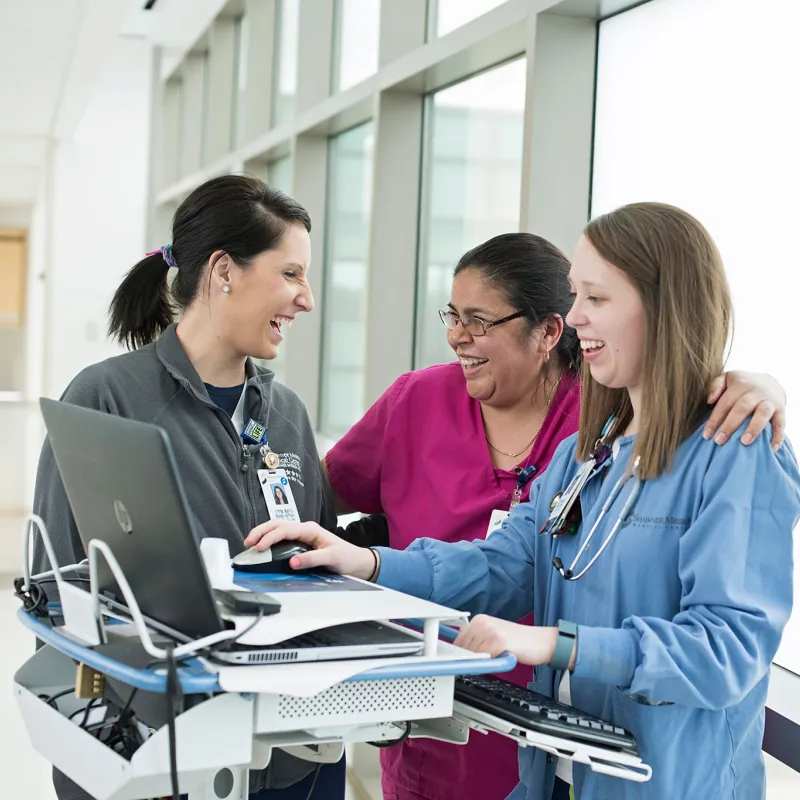 Group of nurses happily working together.