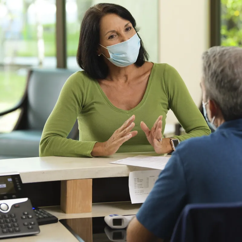 A woman checking in for an appointment.