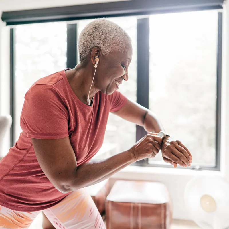 A woman exercising at home.