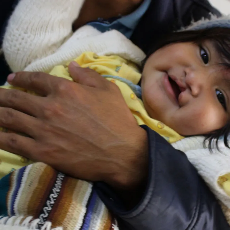 a baby being held
