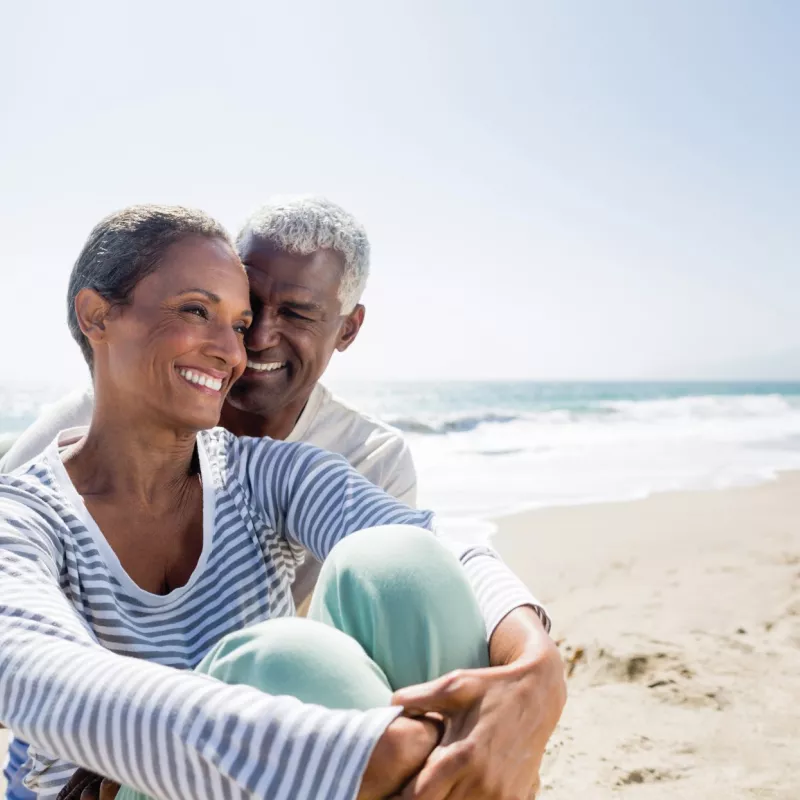 A man and a woman on the beach together