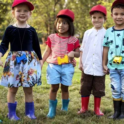 kids standing in a circle and holding hands