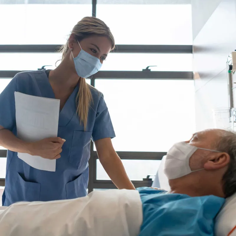 kind-nurse-checking-on-her-patient-2000x1333px