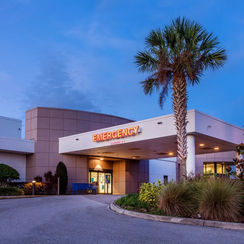 A photo of the AdventHealth Lake Wales facility at dusk.