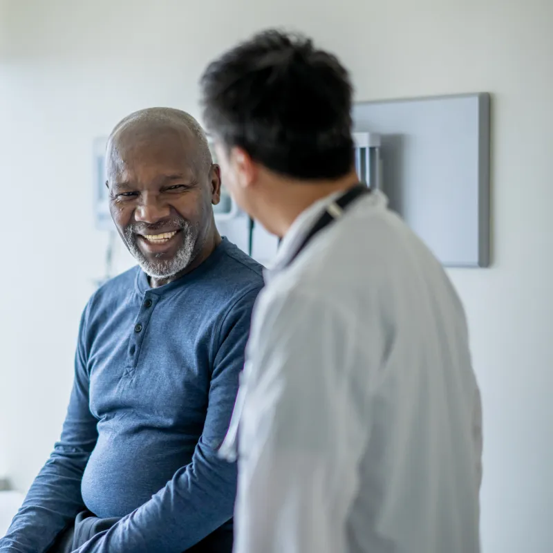 Man Talking to Doctor