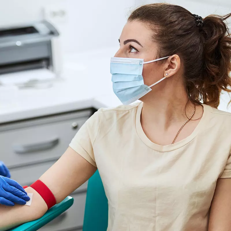 A woman getting ready for a blood test