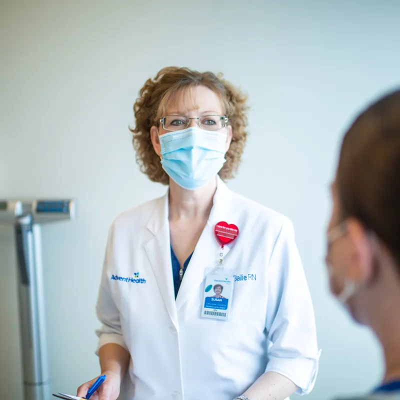 Physician talking with a patient.