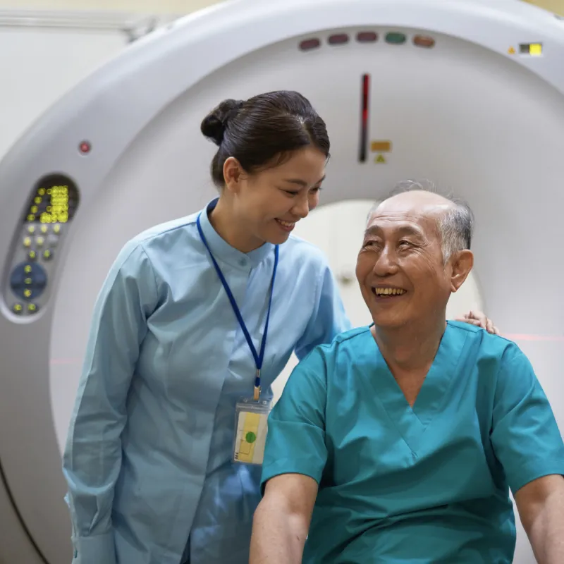 Nurse talking with a patient before an imaging scan