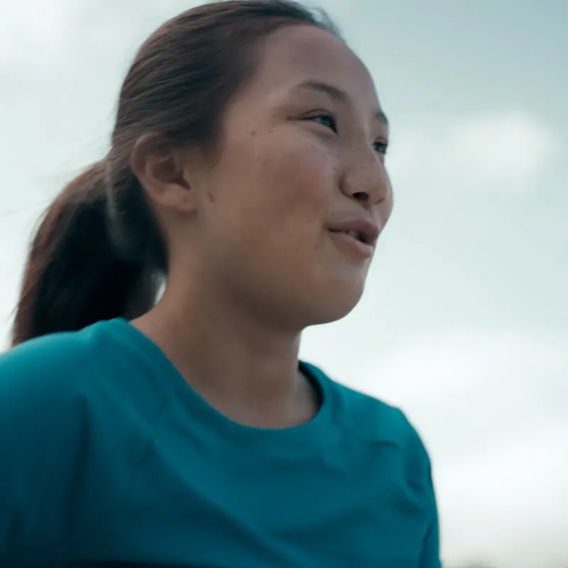 A Woman Jogging Outdoors