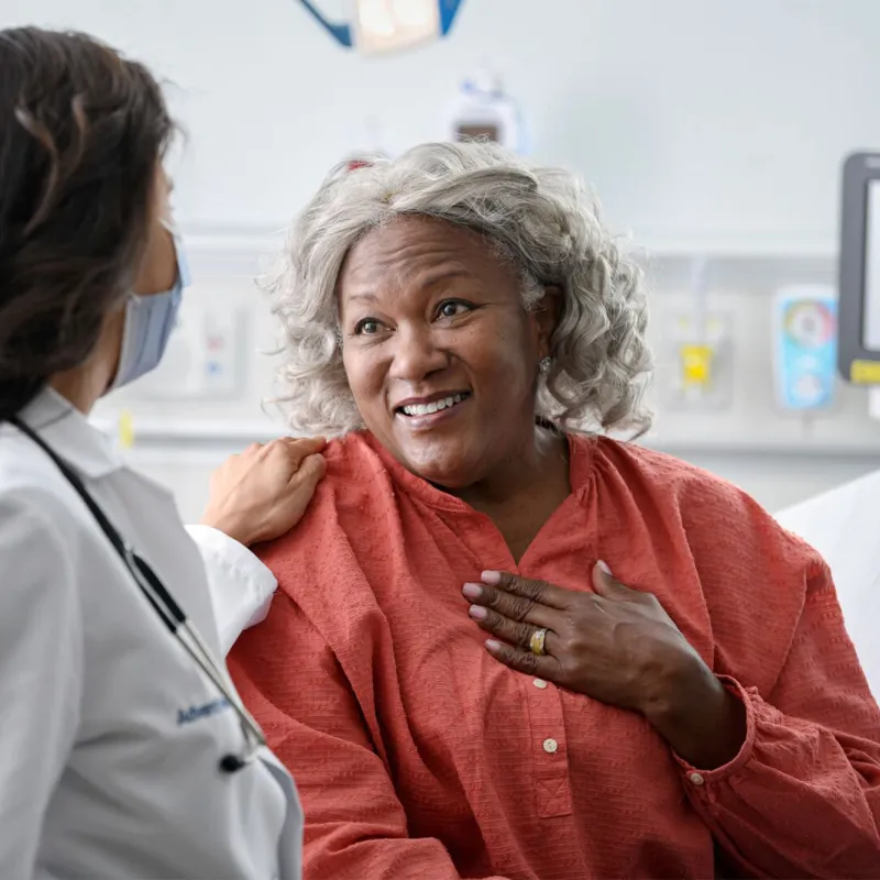 Older Woman Speaking with Her Doctor