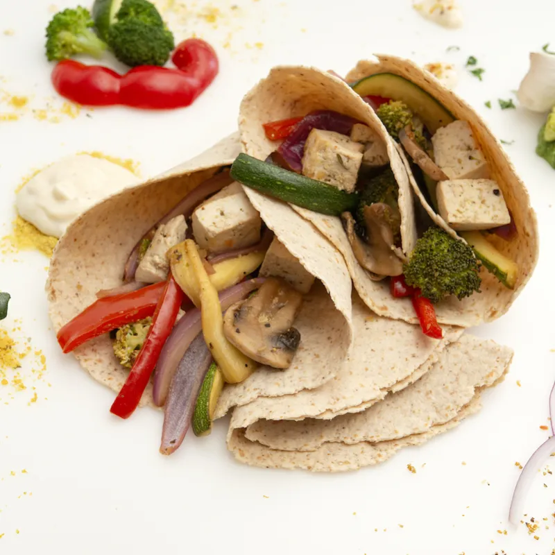 roasted vegetable wrap with veggie garnishes