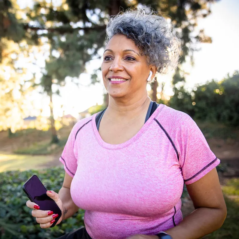 Senior Woman a little overweight pink shirt