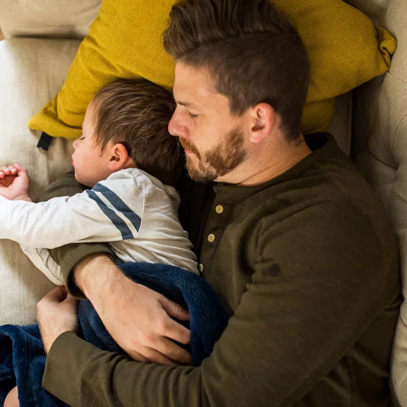 Man and son sleeping