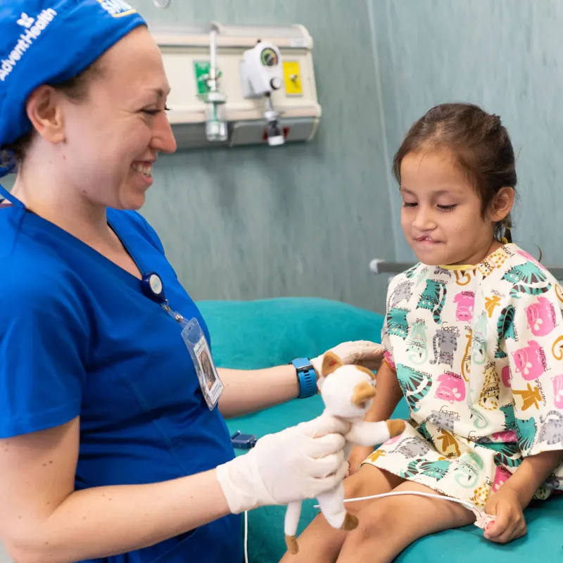 A doctor with a young female patient