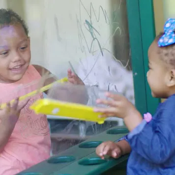 Two children playing together.