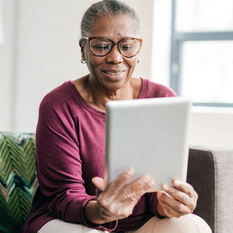 Woman reading tablet