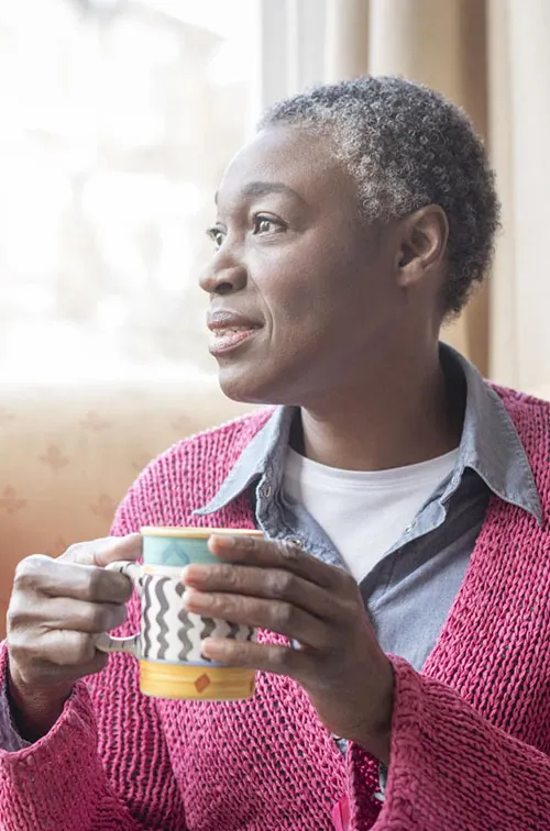 Mature Woman at Window