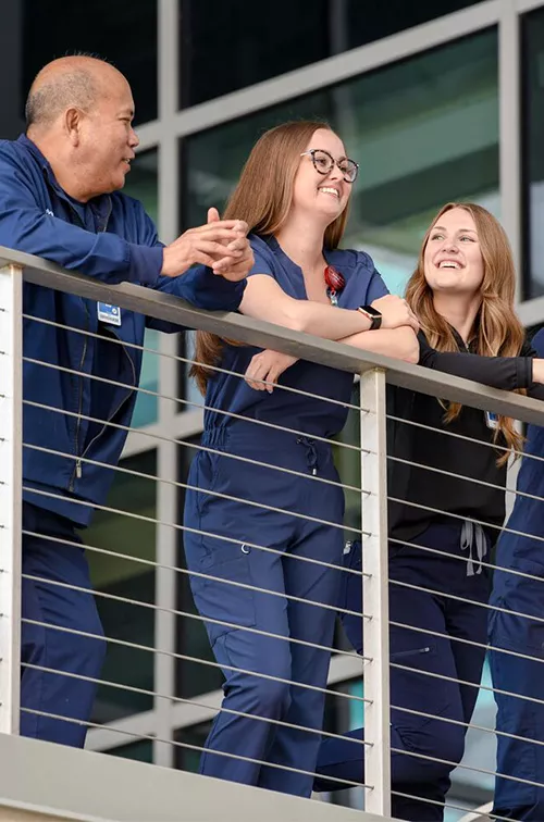 AdventHealth nurses standing together on a walkway