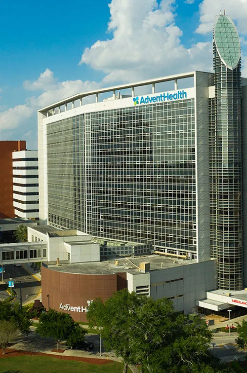 A photo of AdventHealth Orlando, shining in the sunlight.