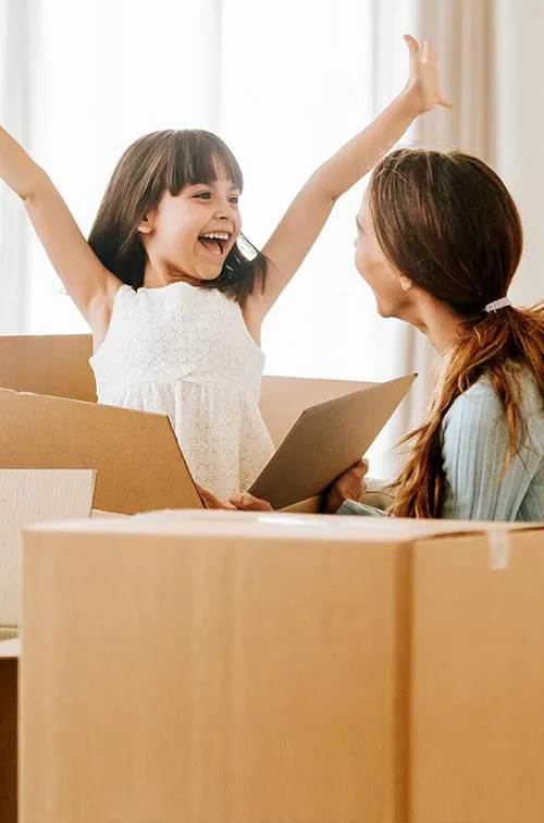 Family unpacking boxes