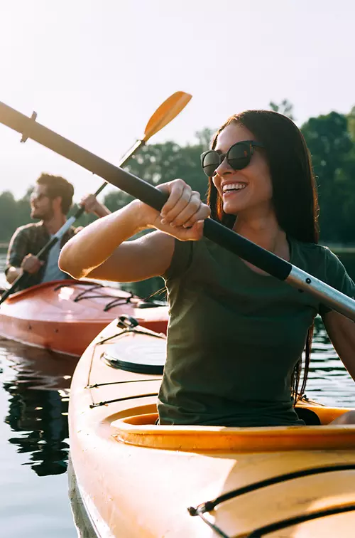 Couple Kayaking on a lake.