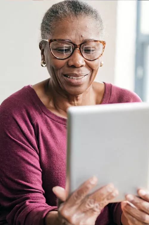 Woman reading tablet