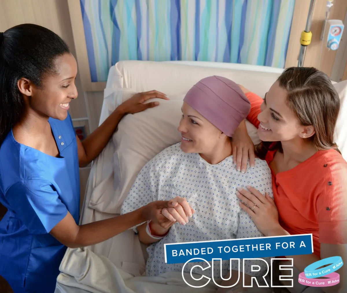 A cancer survivor with a nurse and friend