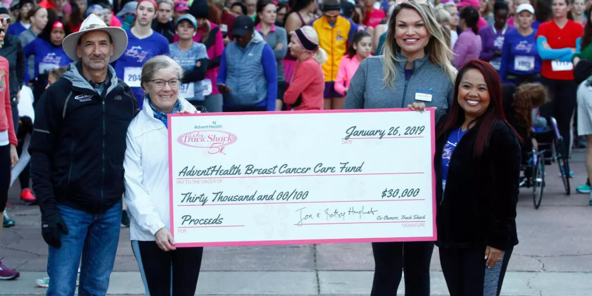 Check presentation, AdventHealth Lady Track Shack 5k