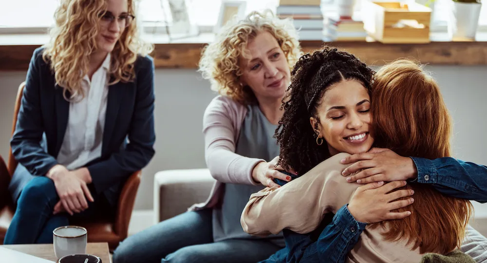 women support each other in a breast cancer support group