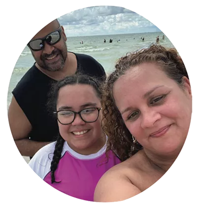 A father, mother and child at the beach